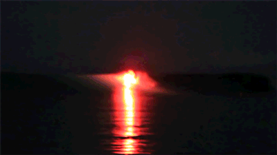 Flare-Surfing-At-Night-Time-Gif.gif